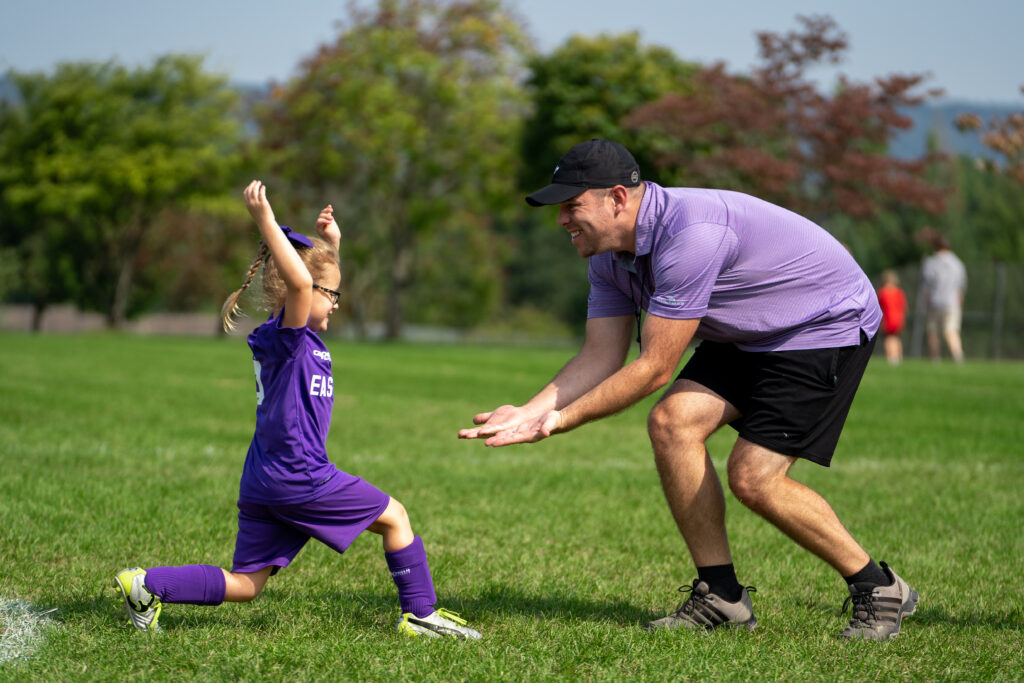 sports photos explained: the art behind the action high fiving emotion sports photos