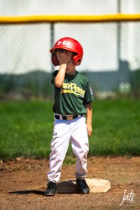 why candid photos make the best memories candid photos of a kid facepalming from baseball